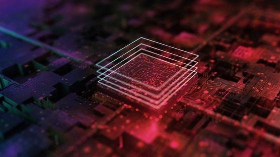 A stacked chip outline glowing above a circuit board