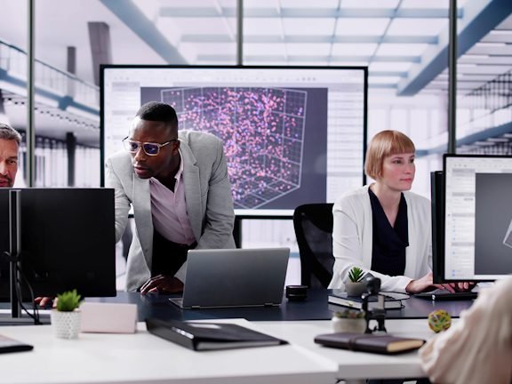 Analysts reviewing a live enterprise data model together