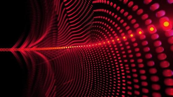 A tunnel of red dots converging to a bright line