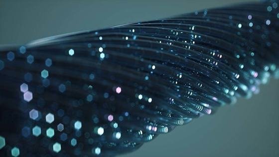A cable of blue fibres studded with points of light