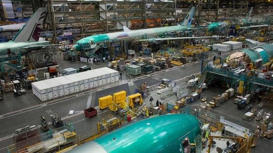Aircraft assembly line, the kind of multi-facility production this coordinated