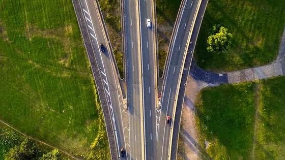 Aerial view of a motorway junction where three carriageways converge