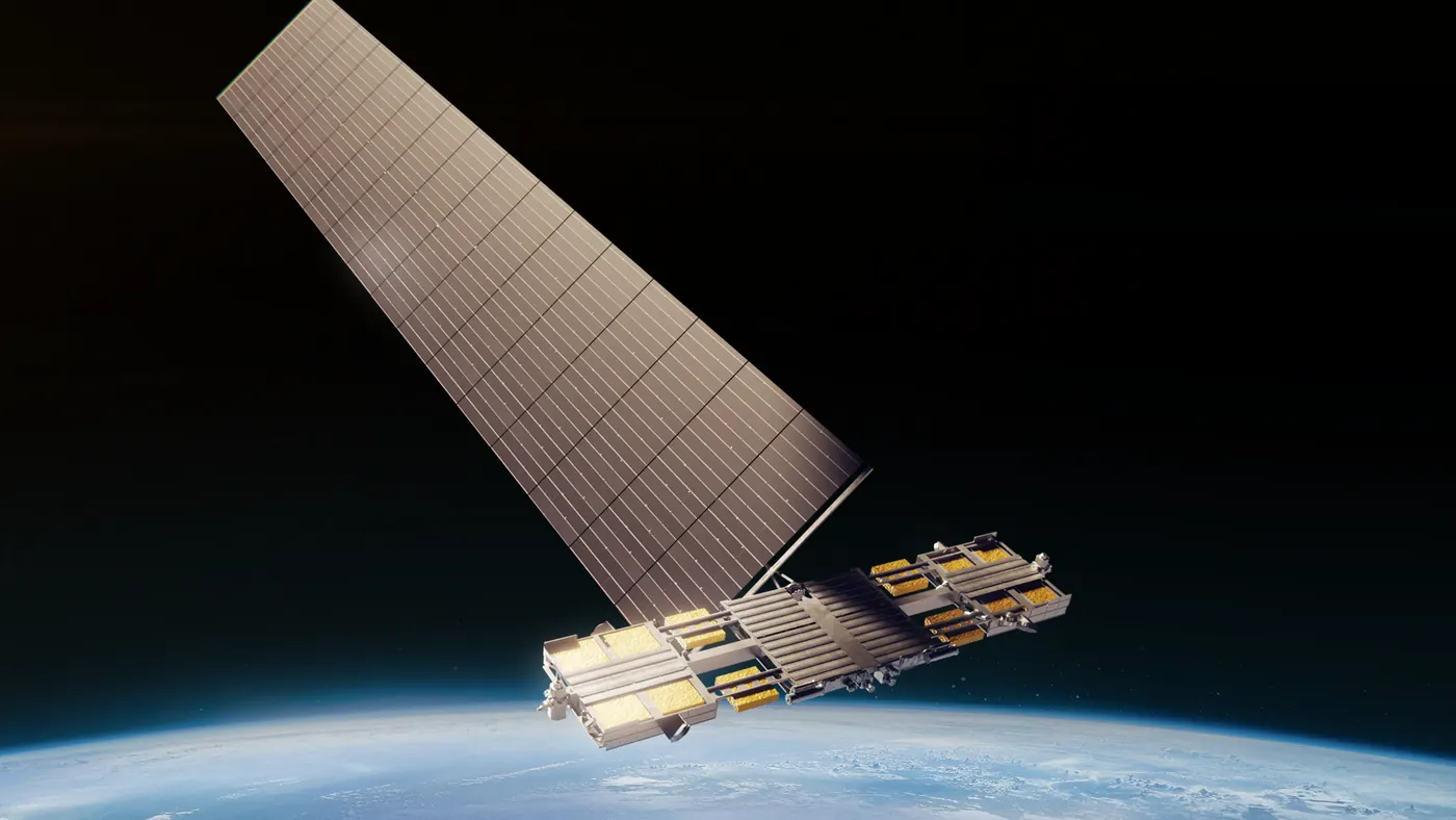 A satellite in low earth orbit with its solar array extended, the curve of the earth below